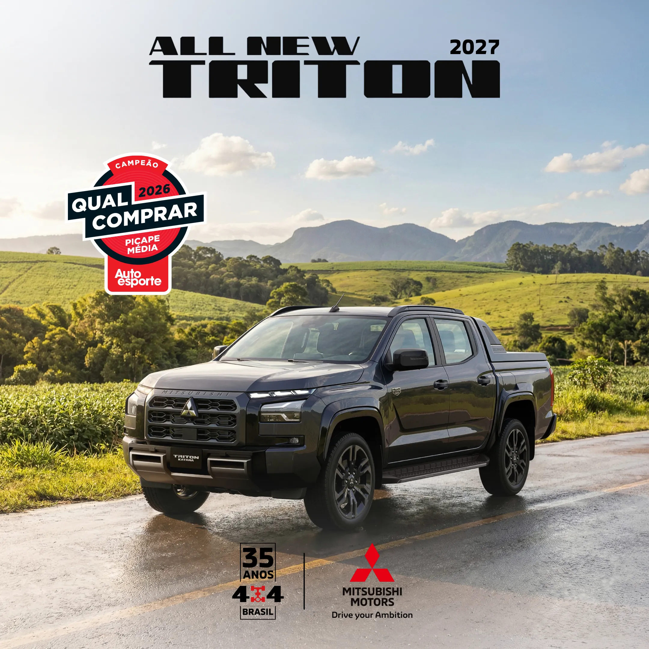 All New Triton 2027 cinza numa estrada de terra entre plantações